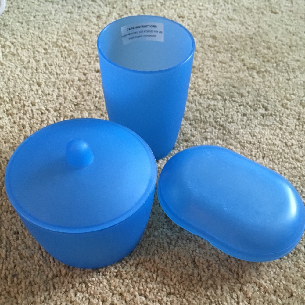 Blue plastic bathroom accessories set- soap dish, storage container, and cup